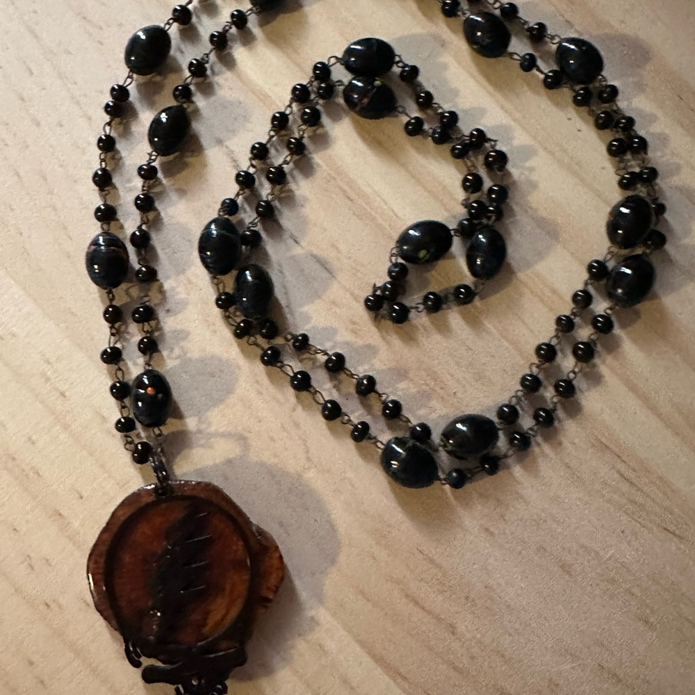 Fabulous aged cedar with Black Stealie on vintage bead Necklace